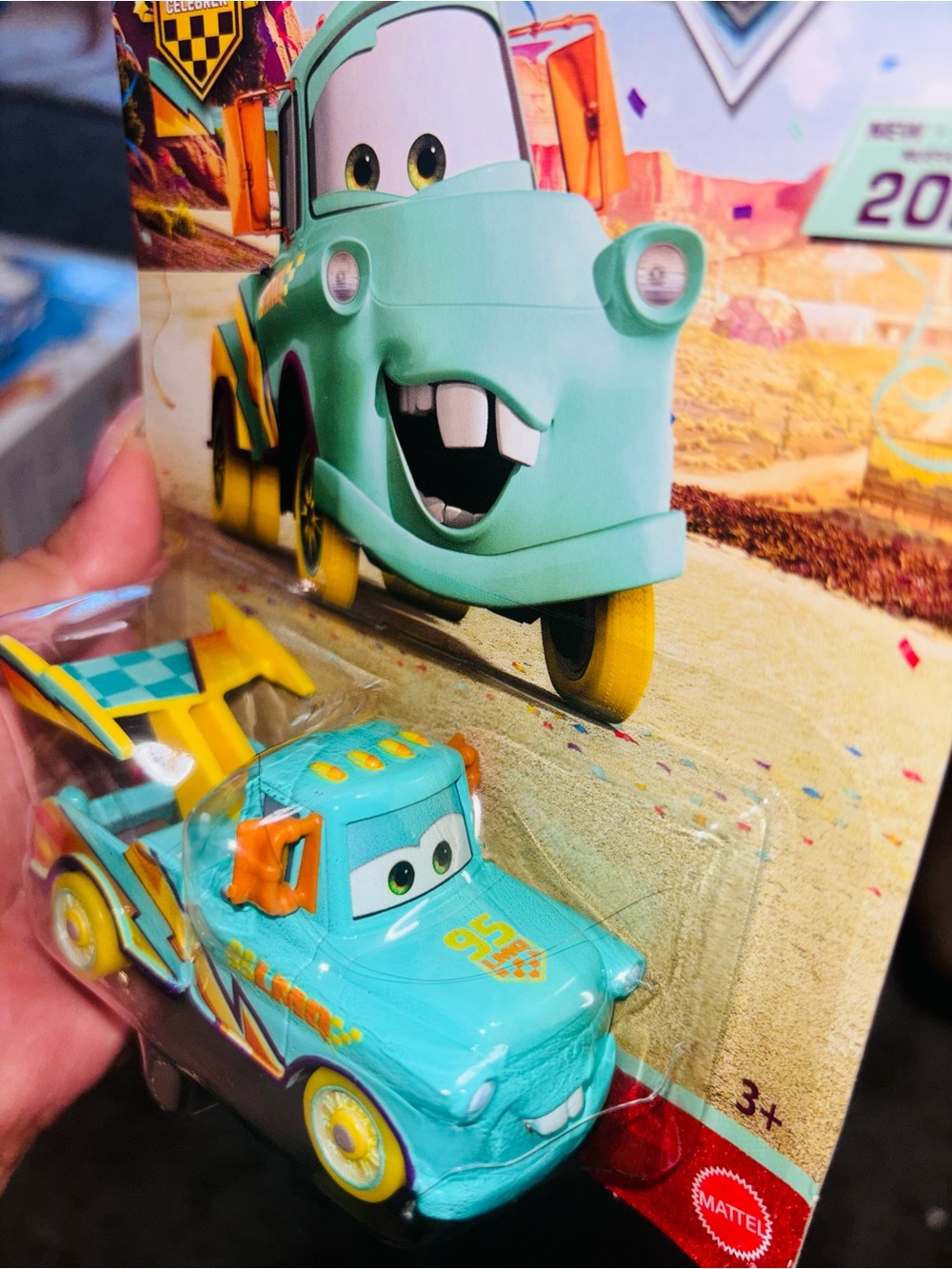 Disney Turquoise Tow Truck Toy with Yellow and Orange Accents